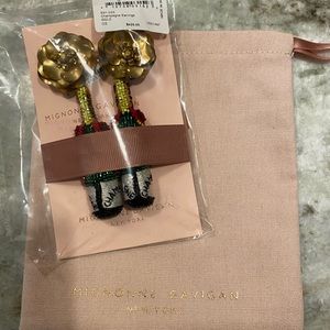 Mignonne Gavigan champagne earrings. New in package.